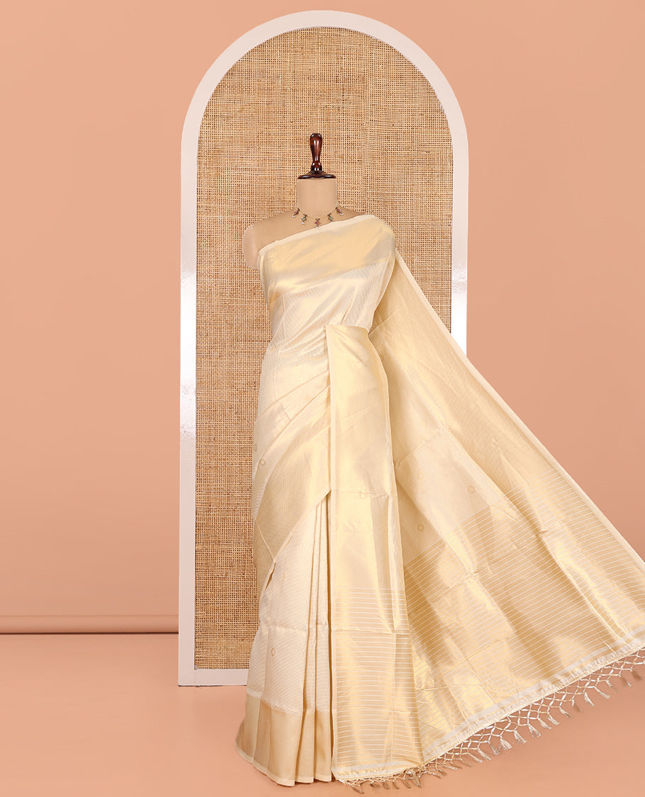 Gold Elite Soft Silk Saree, Gleamed Up with Zari Buttas and Stripes, Highlighted by a Zari Border, Zari-Striped Pallu, and a Matching Blouse