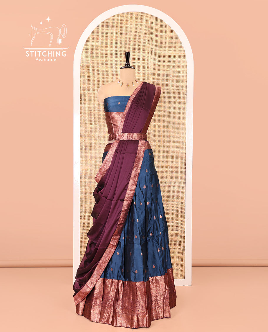 Blue-Magenta Semi-Banarasi Half-Saree Features Zari Buttas Skirt, a Contrast Traditional Zari Border, a Matching Blouse, and a Contrast Satin Georgette Dhavani