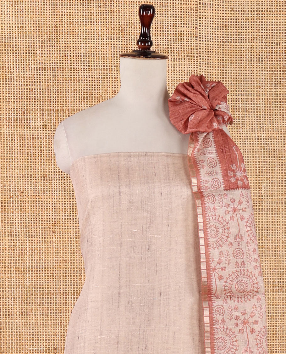 Chikku color semi-tussar material chudidar set, warli motifs top, contrast rust plain bottom & dupatta steeped with warli motifs