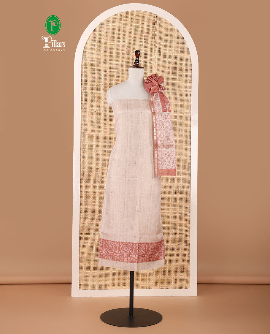 Chikku color semi-tussar material chudidar set, warli motifs top, contrast rust plain bottom & dupatta steeped with warli motifs