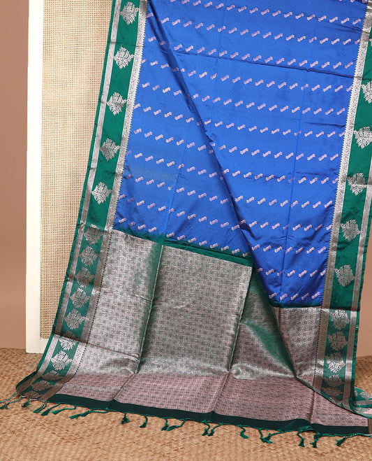 Blue zari buttas silk saree, contrast traditional zari border, and geometric pallu