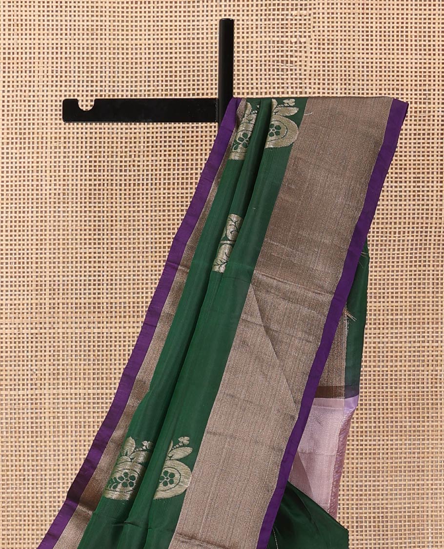 Deep green zari buttas Uppada saree, contrast bavanji border, and jaal patterned pallu