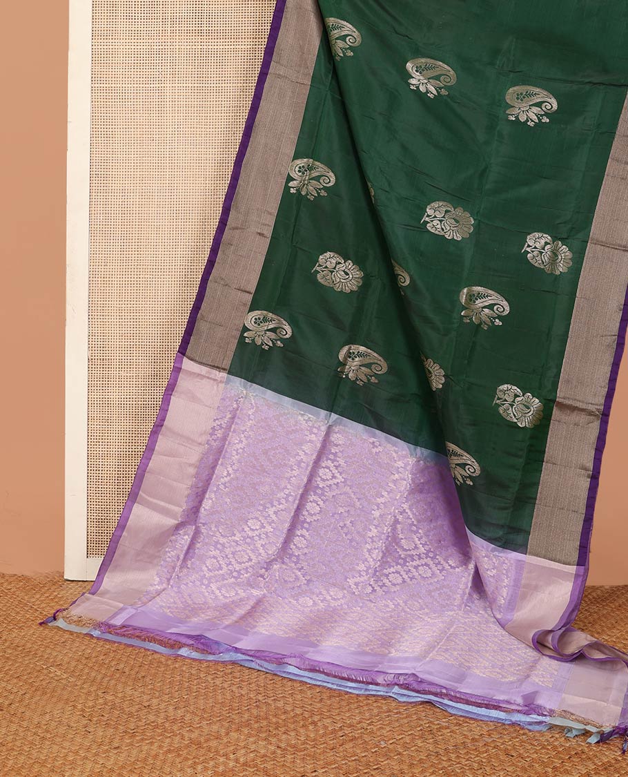 Deep green zari buttas Uppada saree, contrast bavanji border, and jaal patterned pallu