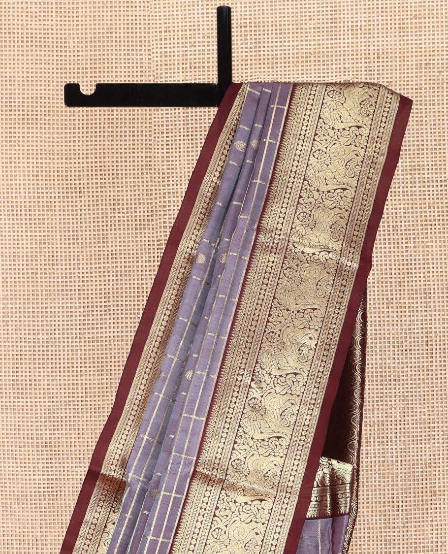 Grey Venkatagiri Silk Saree, Enriched with Zari Buttas Enclosed Checked Design on Its Body, Complemented by a Contrast Traditional Zari Border of Yaali Designs, Pallu of Jaal Designs, and Paired with a Contrast Blouse