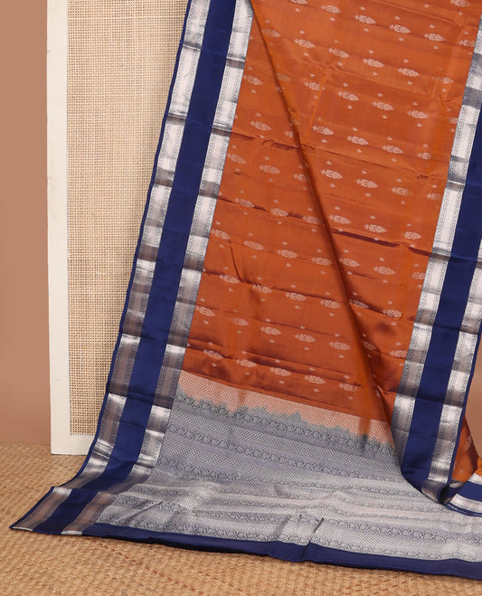 Copper color zari buttas vasundhara elite silk saree, contrast rettai pettu border of rekku, muthu, diamond & kuyil kann & pallu steeped with kodi visiry designs