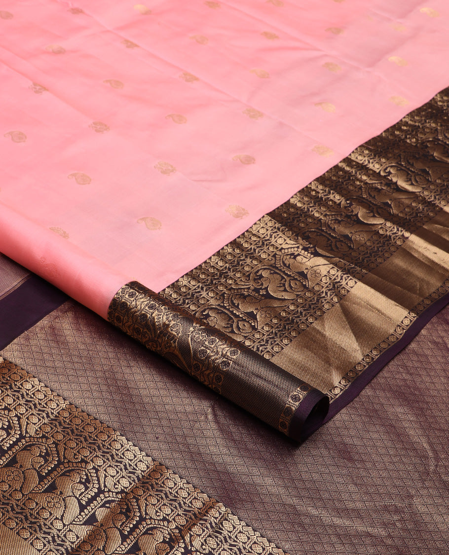 Pink zari buttas silk saree, contrast border of rudraksham, neli and mayil designs, and jaal pallu