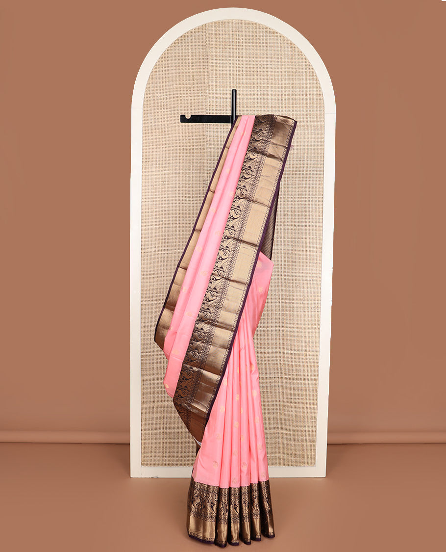 Pink zari buttas silk saree, contrast border of rudraksham, neli and mayil designs, and jaal pallu