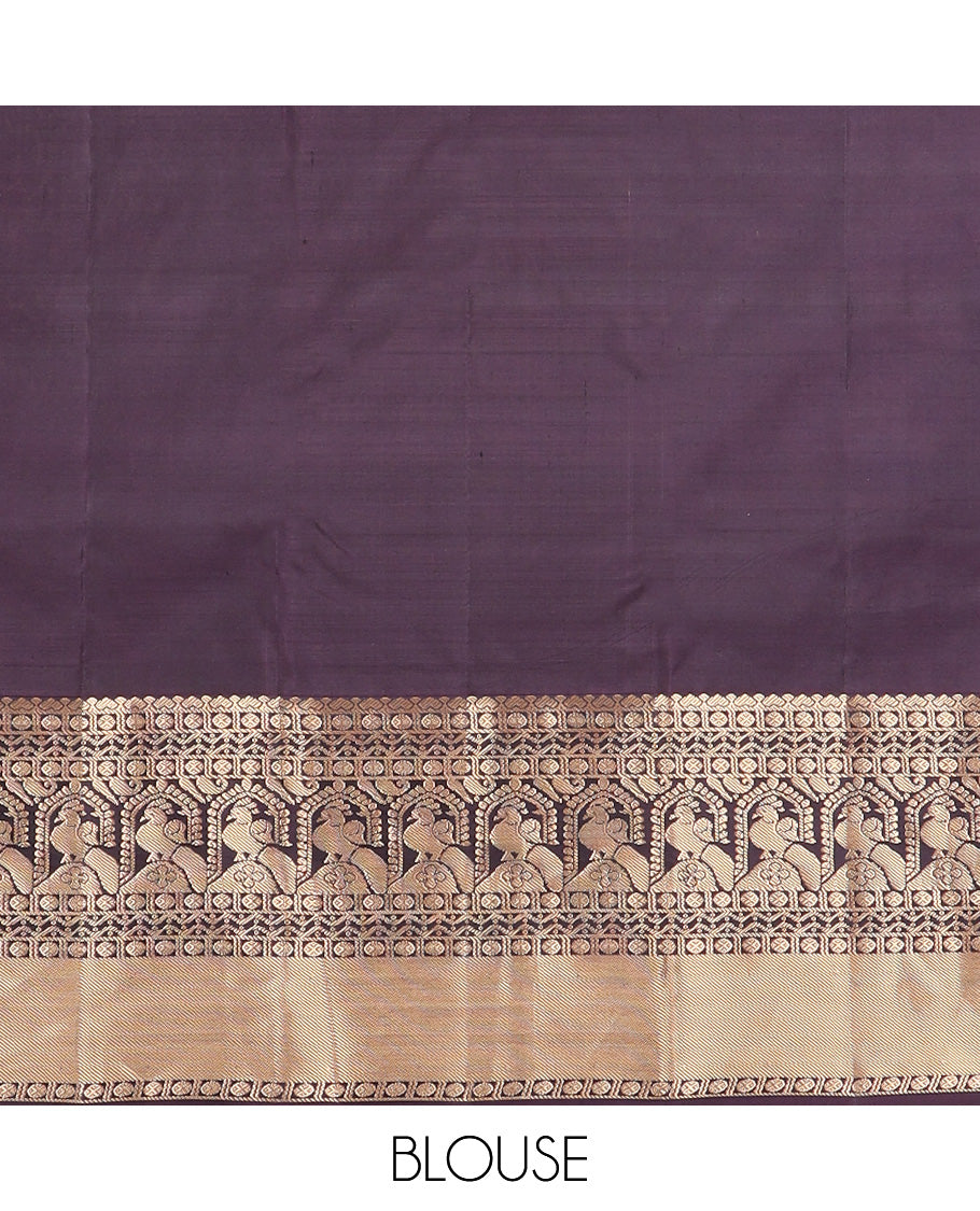 Pink zari buttas silk saree, contrast border of rudraksham, neli and mayil designs, and jaal pallu