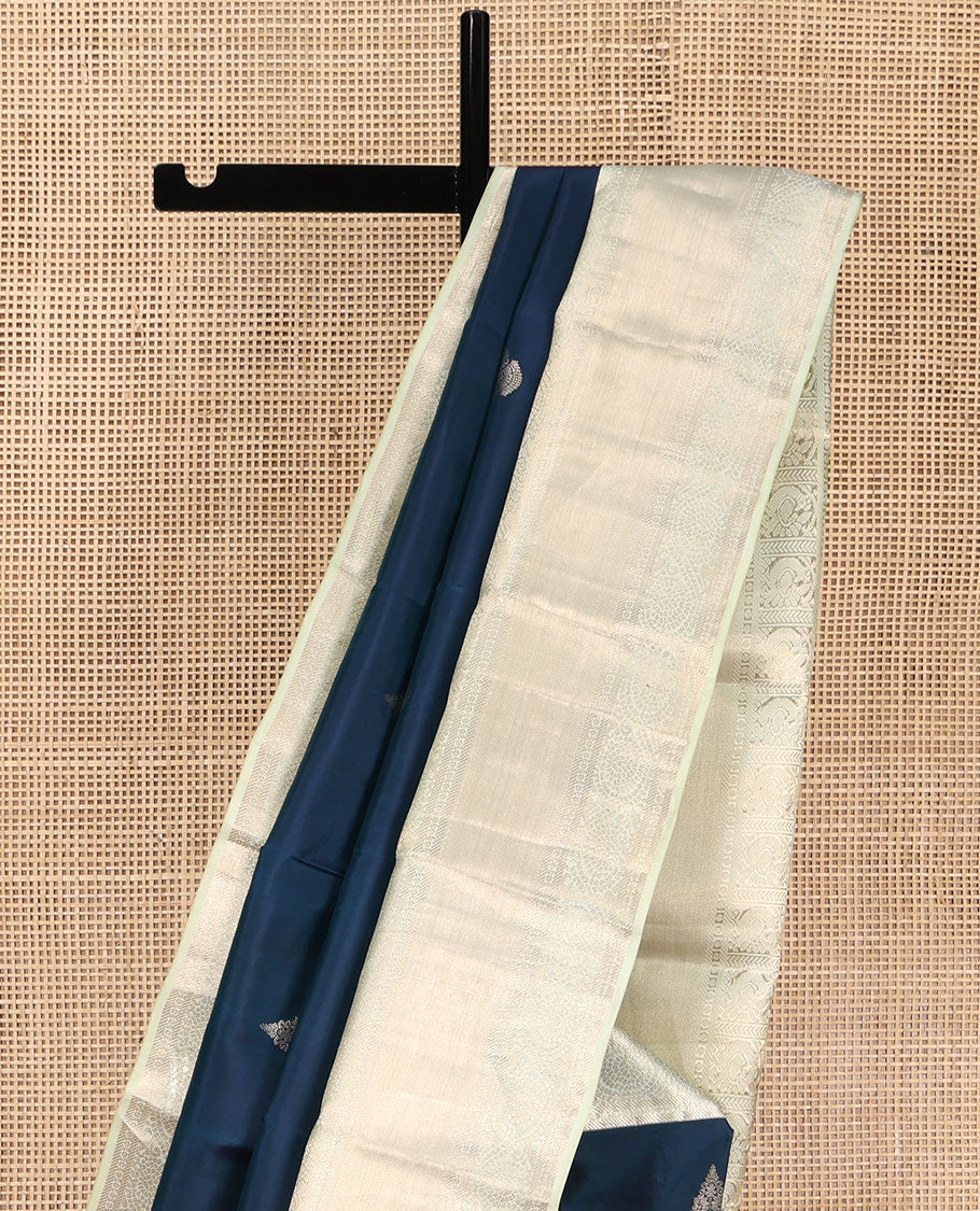 Blue Vasundhara Lite Silk Mix Saree, Elegantly Highlighted with Zari Buttas on Its Body, Complemented by a Contrast Zari Border of Banaras, Paisa, and Mayil Designs, Intricately Designed Pallu, and Paired with a Contrast Blouse