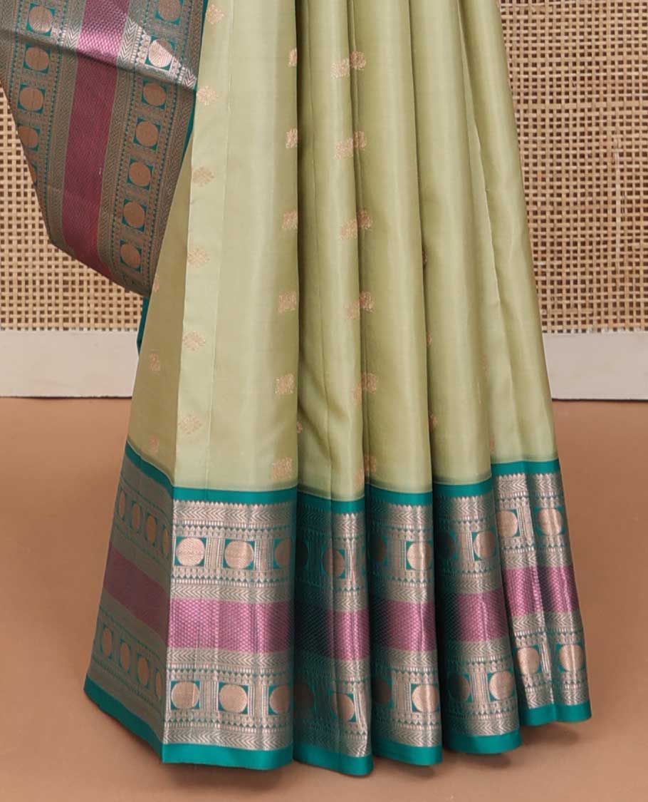 Green zari buttas silk saree, contrast border of rekku, kathir, poun, and mayil kann, and jaal pallu