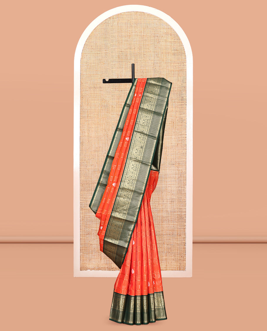 Orange Vasundhara Silk Saree Showcasing Zari Butta Enclosed Checks, Contrast Border of Muthu, Mayil, Rudraksham, and Banaras Designs, Jaal Pallu, and Contrast Blouse