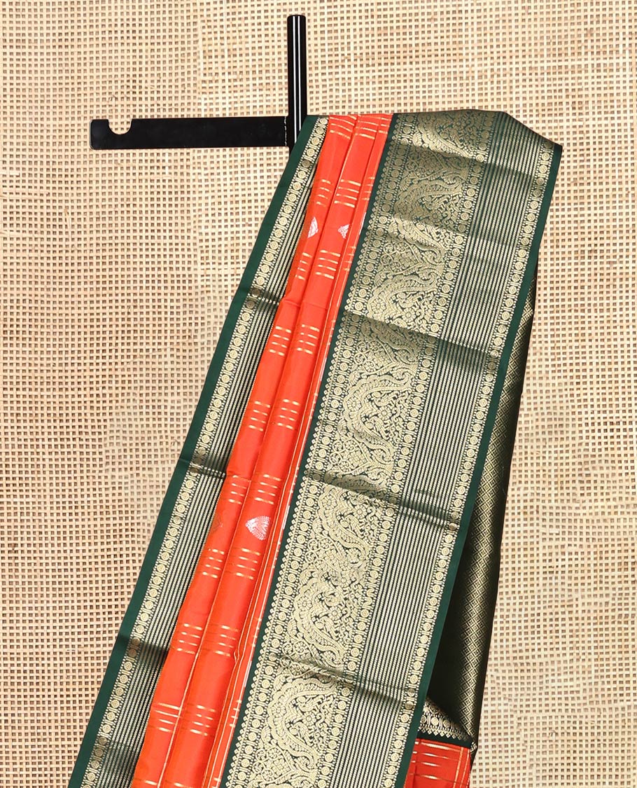 Orange Vasundhara Silk Saree Showcasing Zari Butta Enclosed Checks, Contrast Border of Muthu, Mayil, Rudraksham, and Banaras Designs, Jaal Pallu, and Contrast Blouse