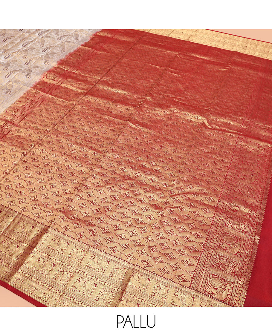 Cream Kanchipuram Silk Saree Artfully Woven with Bird Jacquard Design, Complemented by Contrast Border of Rekku, Mayil, Arumbu Manga, and Chakram Designs, Elegantly Highlighted Pallu of Geometric Patterns, and Paired with a Contrast Blouse
