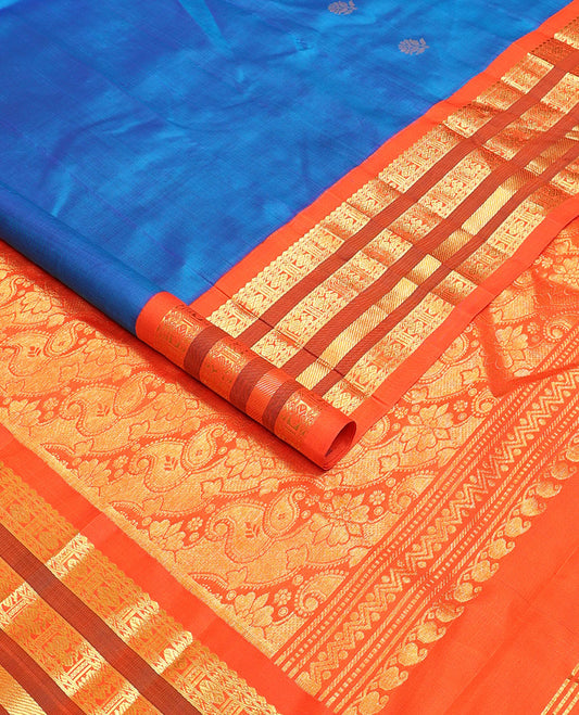 Blue buttas Kanchipuram silksaree, contrast one-sided korvai border of thilakam mokku,neli,rudraksham,mayil & banaras & manga motifs pallu
