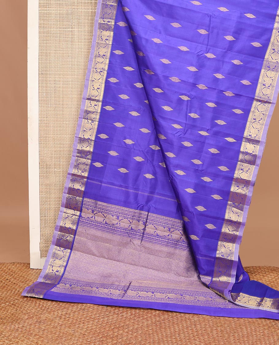 Blue zari buttas Kanchipuram silk saree, contrast border of thazampoo rekku,banaras,kamalam,mayil, and manga, and jaal pallu