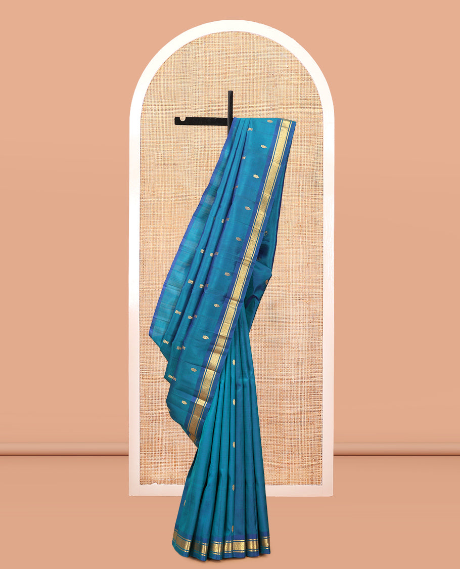Blue Kanchipuram Silk Saree, Woven with Zari Buttas, Complemented by a Contrast Border of Banaras, and Mayil Kann Design, Zari Design Pallu, and No Blouse