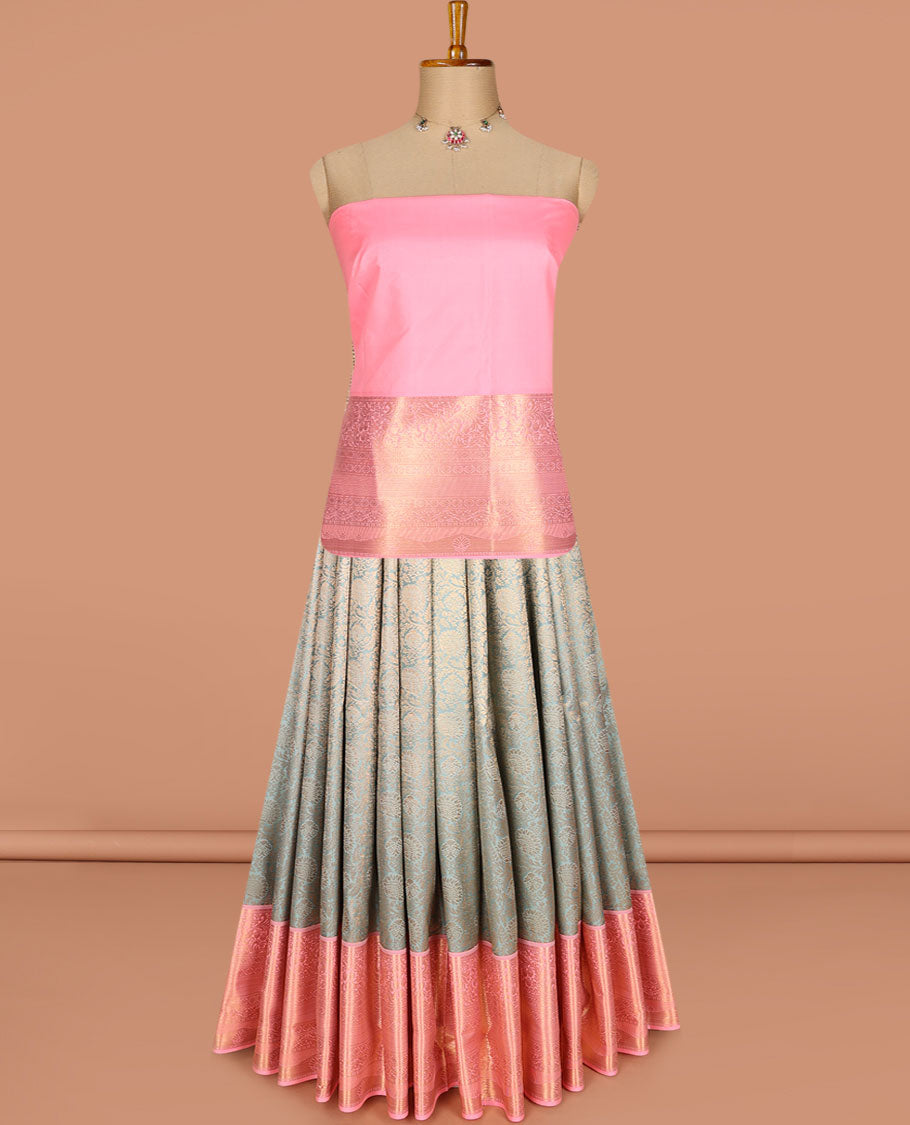 Grey pure-silk half-saree, floral jacquard skirt, contrast blouse, and border of muthu, floral, diamond, kamalam, mayil kann, and kodi visiry designs, and intricate dhavani