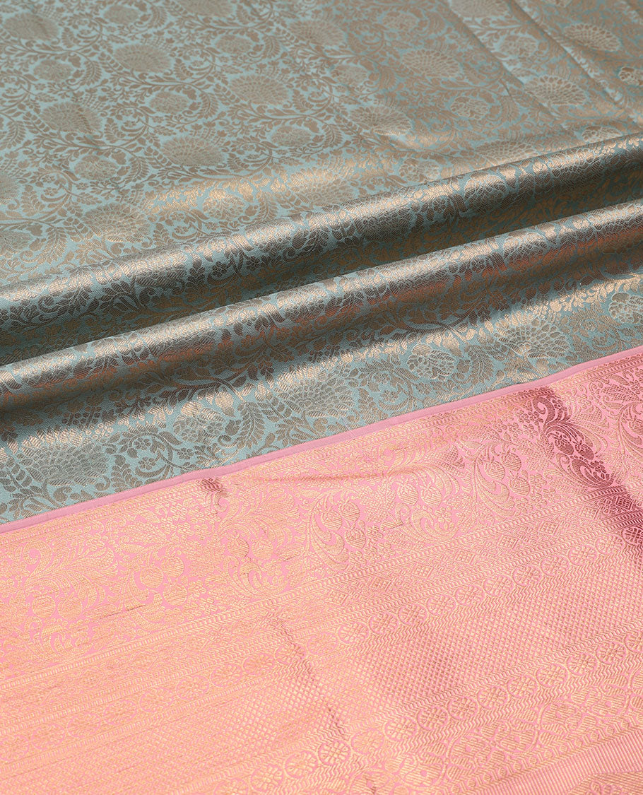 Grey pure-silk half-saree, floral jacquard skirt, contrast blouse, and border of muthu, floral, diamond, kamalam, mayil kann, and kodi visiry designs, and intricate dhavani