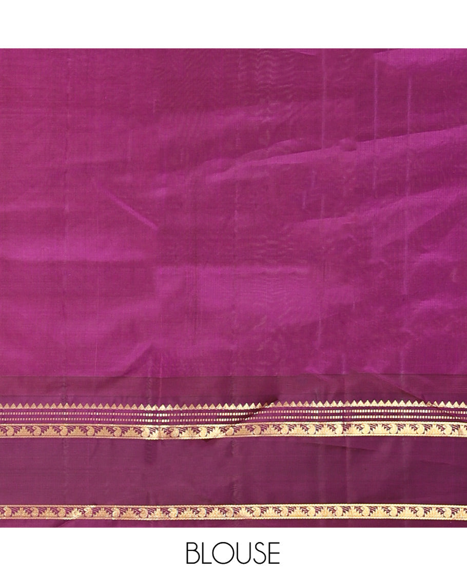 Yellow Vasundhara Silk Saree, Subtly Sparkled with Zari Buttas All Over Its Body, Complemented by a Contrast Rettai Pettu Temple Border of Rekku, Muthu, Manga, and Thazampoo Rekku Designs, Grand Pallu, and Paired with a Contrast Blouse