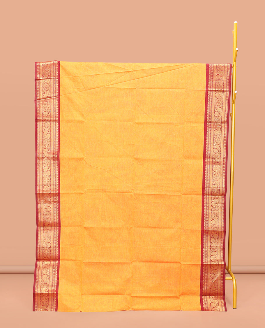 Orange Plain Chettinad Cotton Saree, Complemented by a Contrast Traditional Zari Design Woven Border, Subtle Pallu of Stripes, and Paired with a Matching Blouse