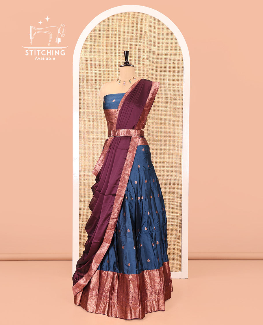 Blue-Magenta Semi-Banarasi Half-Saree Features Zari Buttas Skirt, a Contrast Traditional Zari Border, a Matching Blouse, and a Contrast Satin Georgette Dhavani