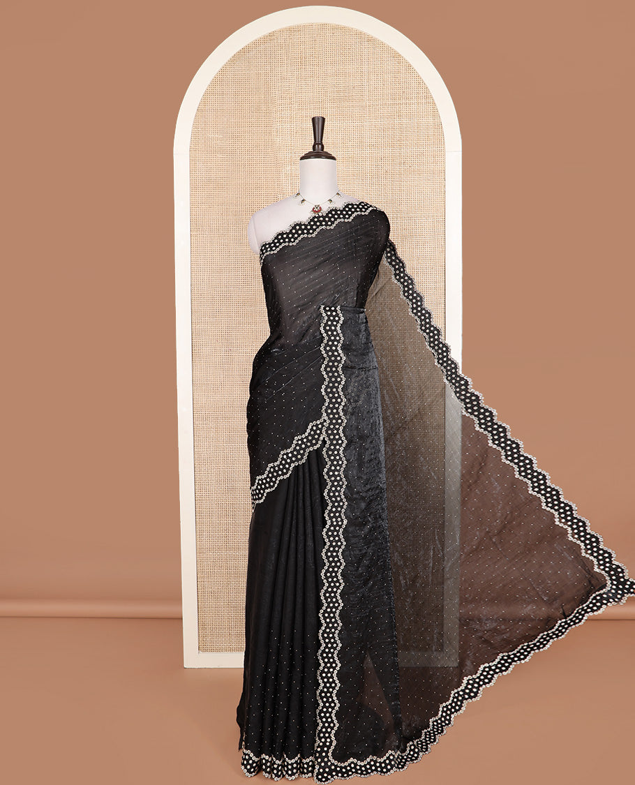 Black stone work designer saree, scallop floral motifs micro stone work border