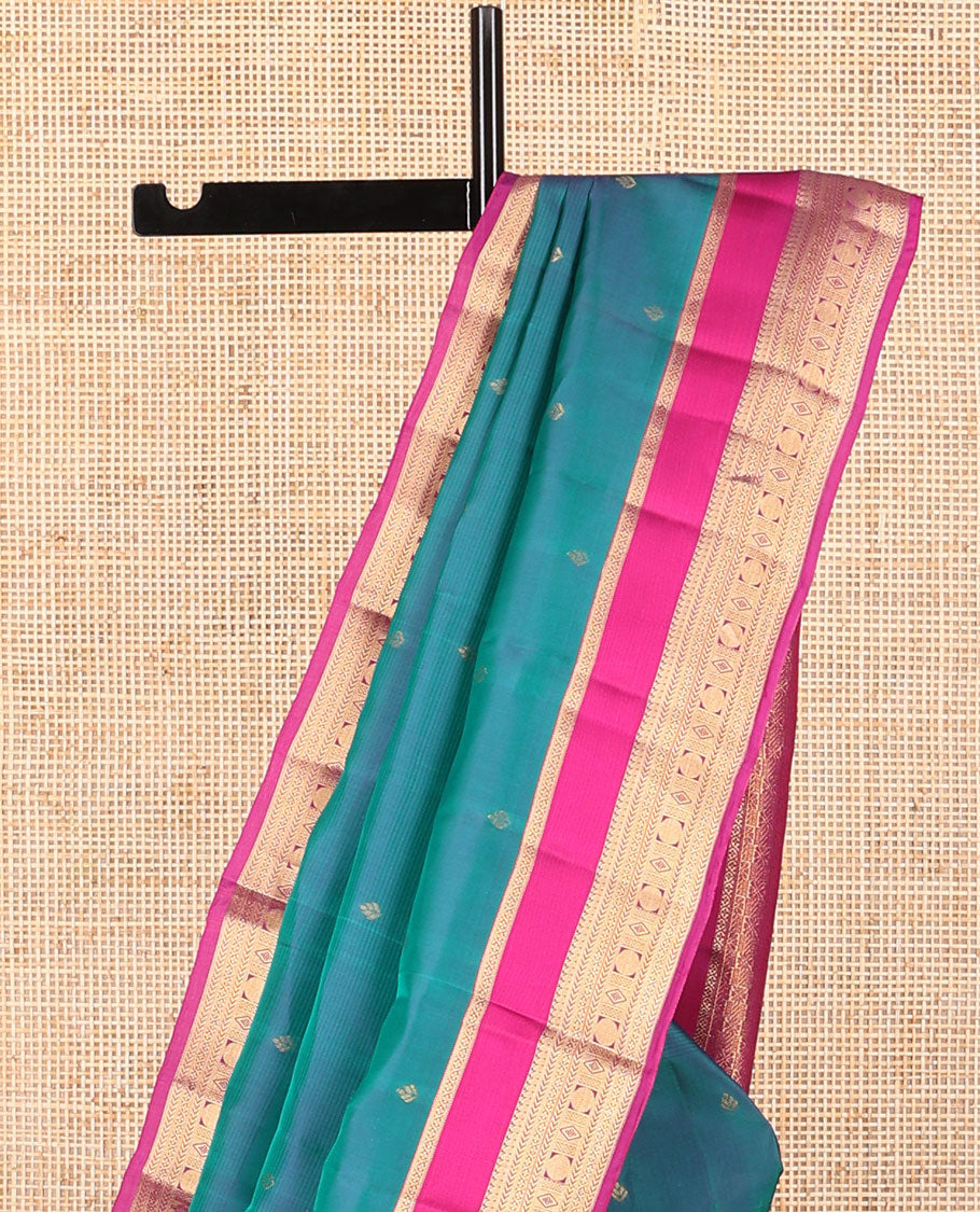 Light blue floral buttas vasundhara elite silk sare with self intricate zari design border & checkered design pallu