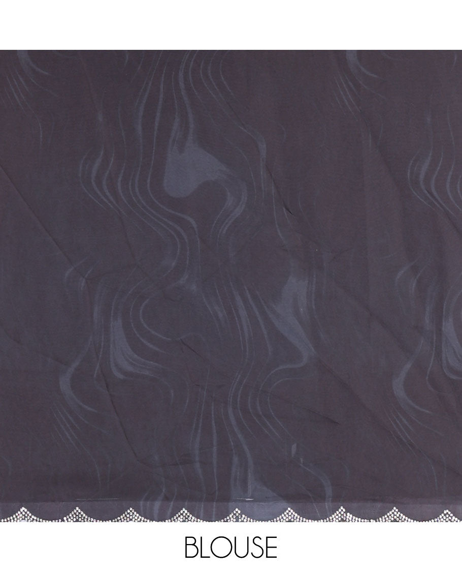 Black and white abstract printed satin crepe saree, scallop jarkan stone work border, self-pallu, and a contrast abstract printed blouse