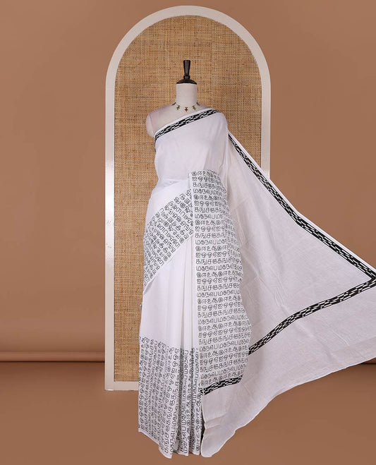 Borderless half-white and black Tamil letters printed Sungudi cotton saree with contrast Tamil letters printed blouse