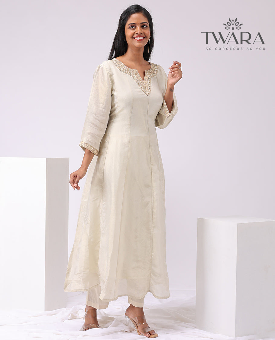 Twara cream floral embroidered v neck, 3/4 th sleeve , below knee lenght with straight pant & scallop border dupatta