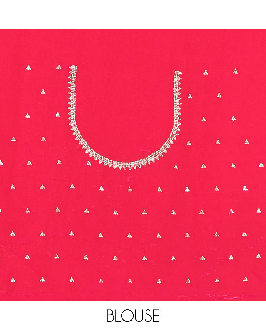 Rani pink micro-stone work fendy chiffon saree with paisley stone work on its shoulder, a scallop stone work border, a butterfly style pallu, and a matching stone work blouse