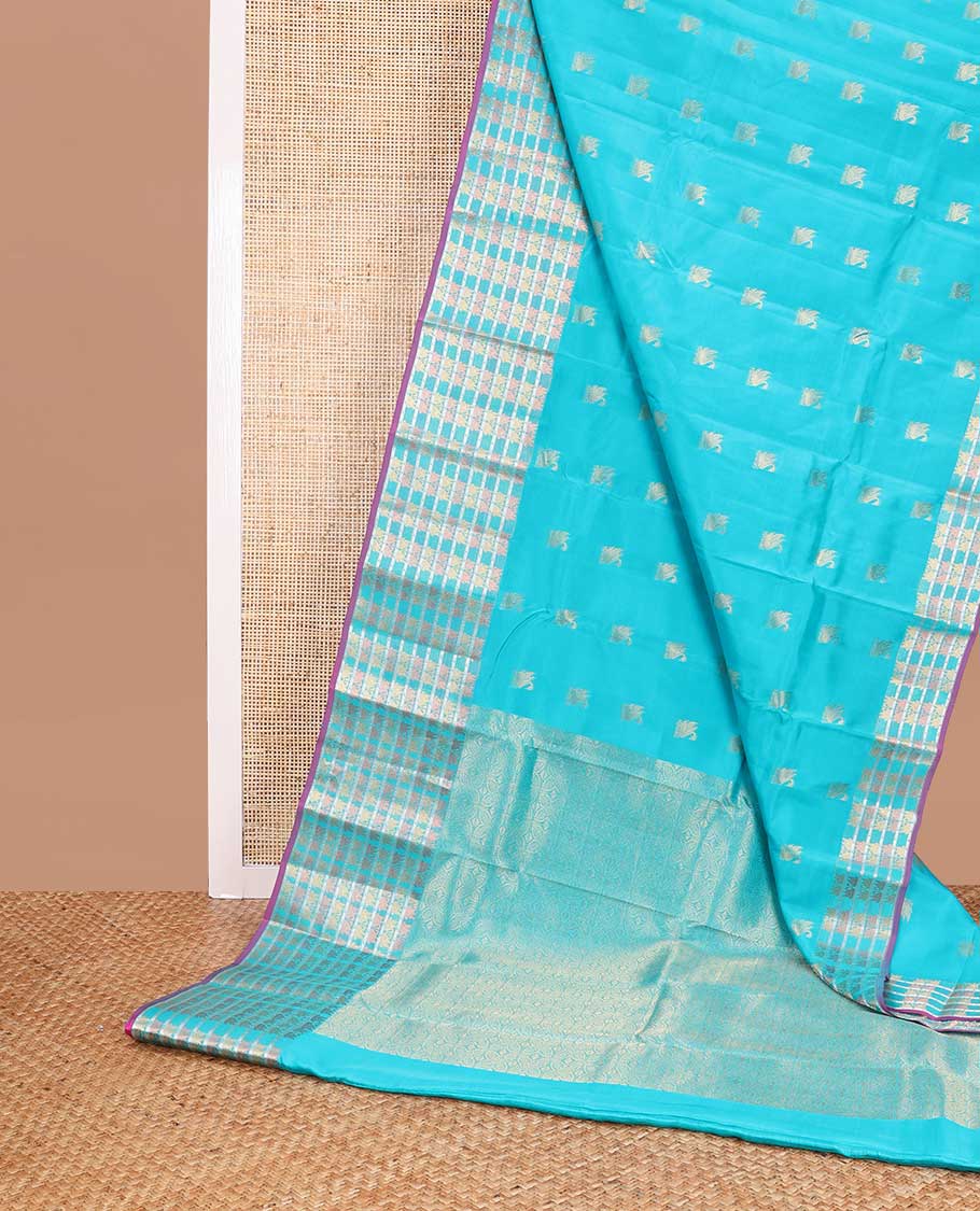 light blue swan buttas vasundhara elite silk saree with self swan design border & floral design pallu