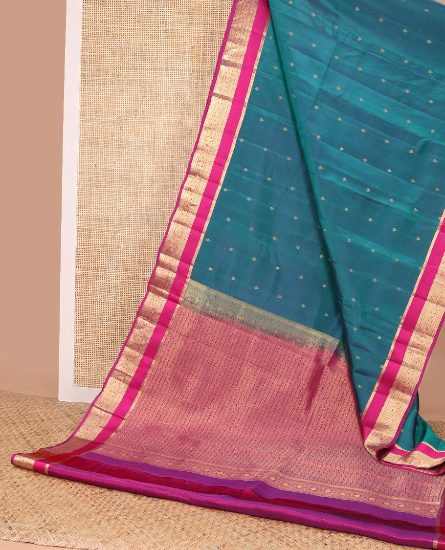 Light blue floral buttas vasundhara elite silk sare with self intricate zari design border & checkered design pallu