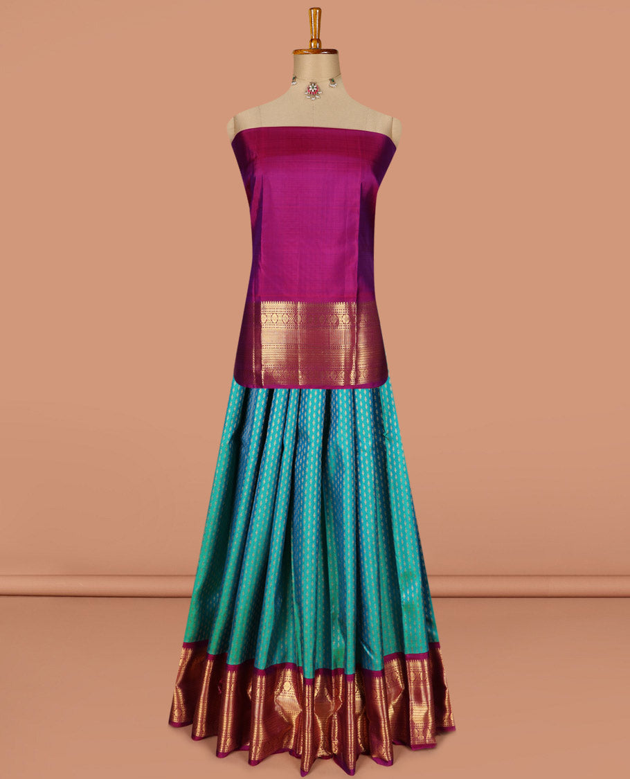Blue puresilk halfsaree, zari buttas skirt, contrast border, blouse of thilakam mokku,banaras,kamalam, and lavangam designs, and intricate dhavani