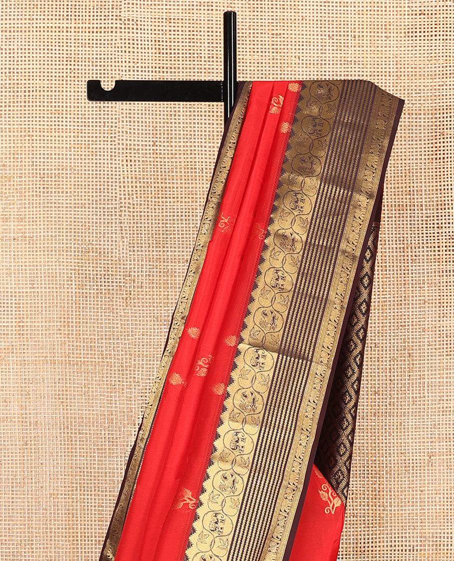 Red zari buttas Vasundhara silk mix saree, contrast border of thazampoo rekku, neli, mayil, and yaanai, and jaal pallu