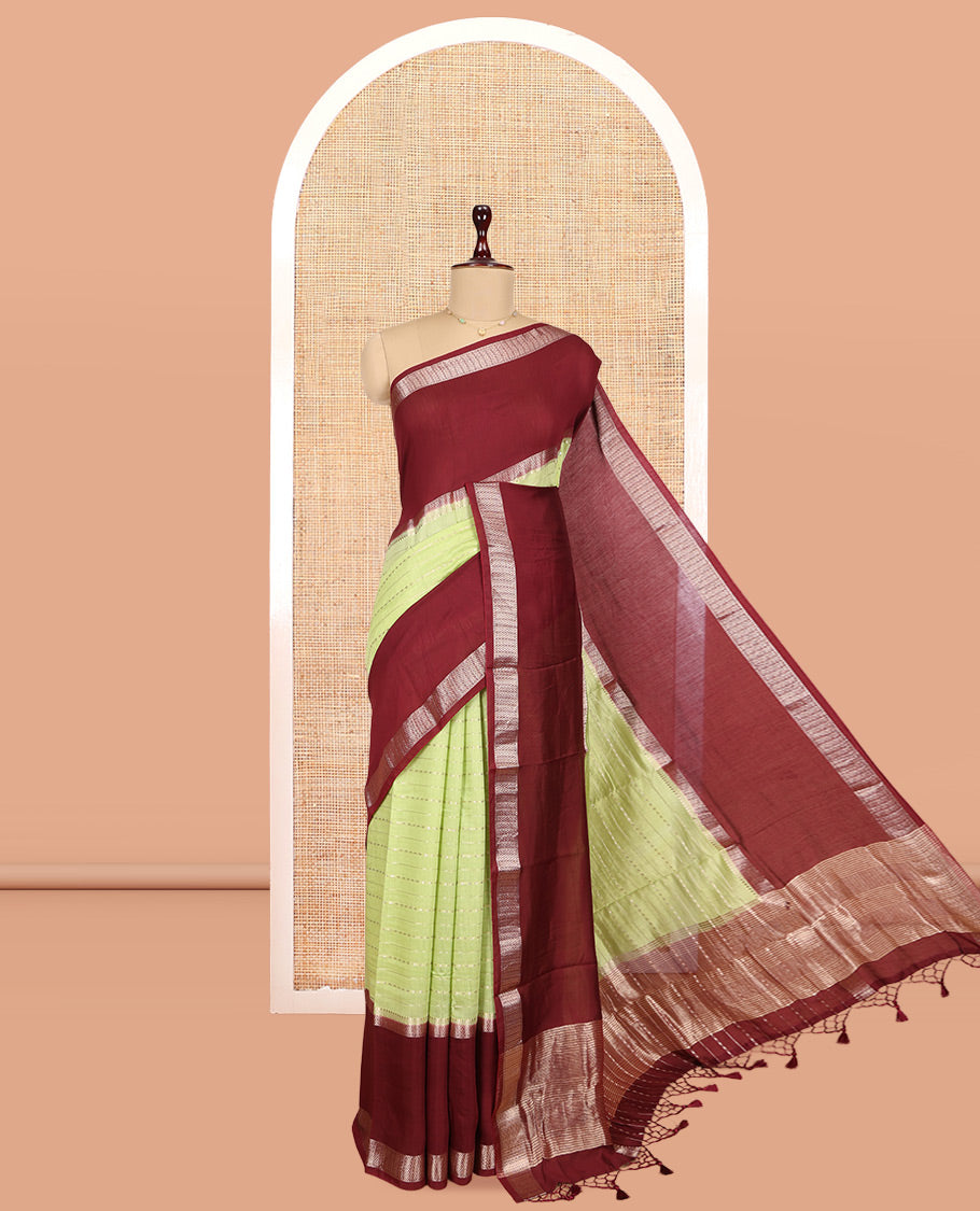 Green Assam Silk Saree, Accentuated with Zari Stripes, Complemented by Contrast Big Zari Border, Zari Woven Pallu, and Contrast Blouse