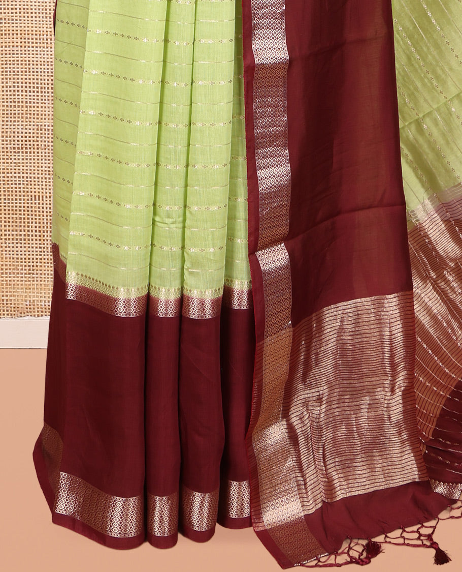 Green Assam Silk Saree, Accentuated with Zari Stripes, Complemented by Contrast Big Zari Border, Zari Woven Pallu, and Contrast Blouse