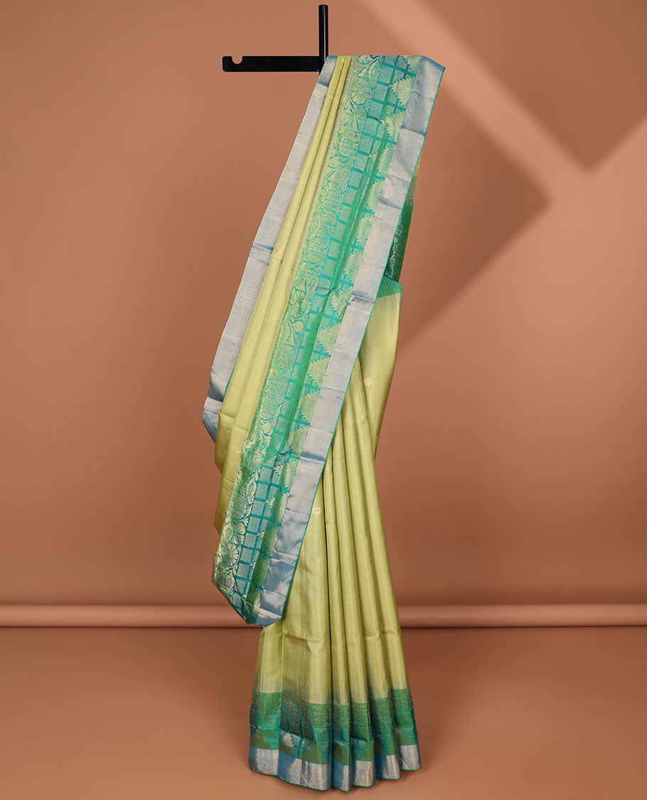 Green buttas soft silk saree with contrast floral border & ogee pattern pallu