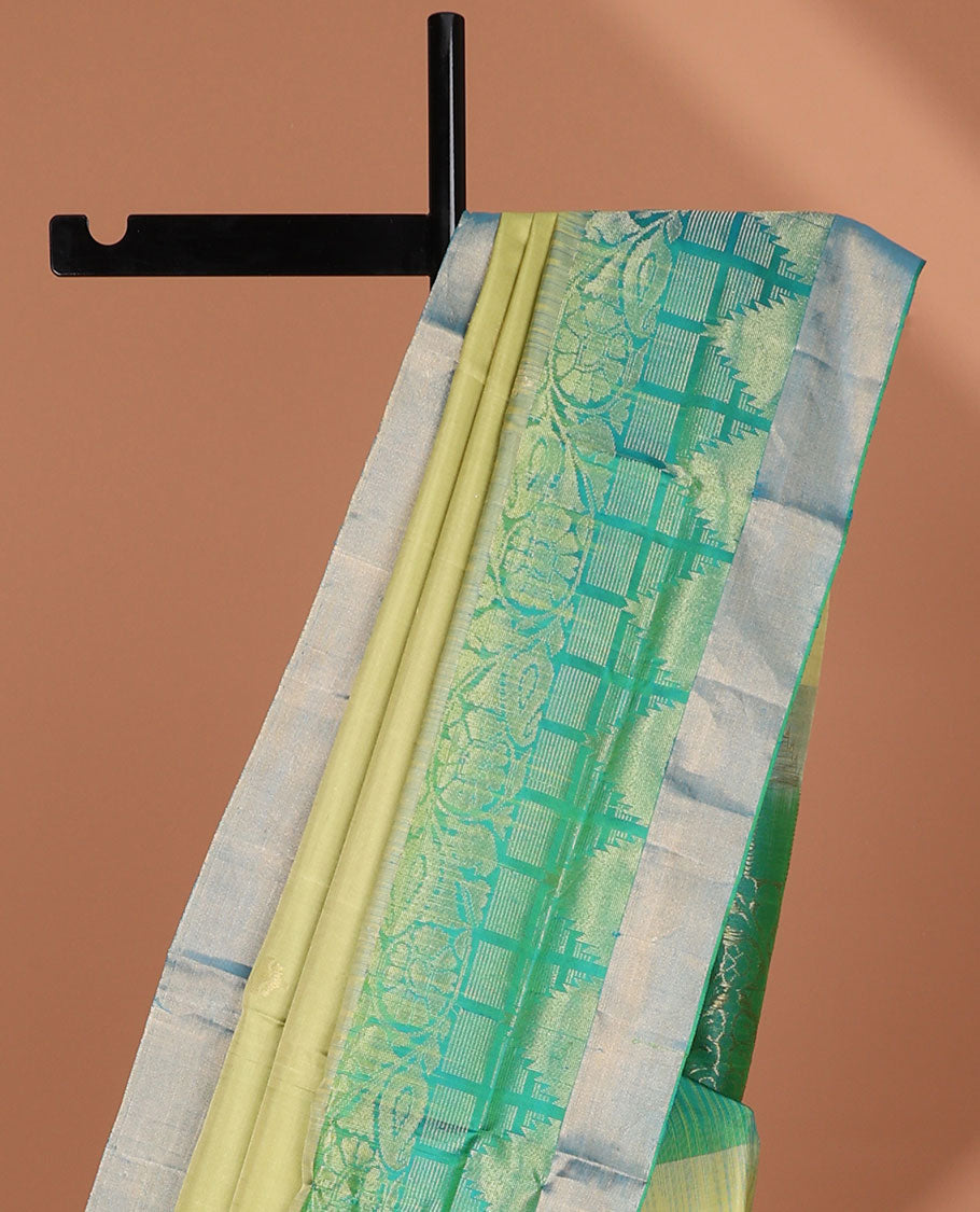 Green buttas soft silk saree with contrast floral border & ogee pattern pallu