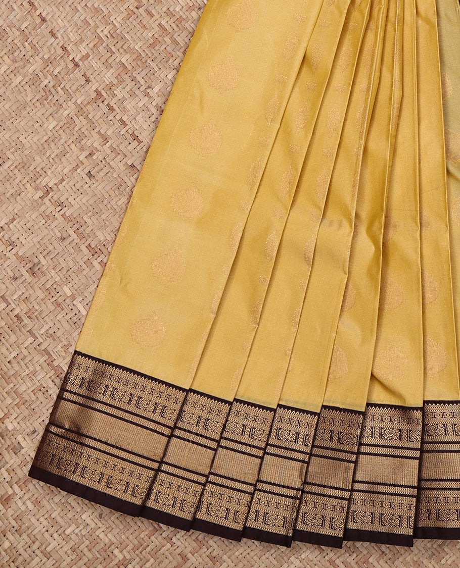 Sandal Budget Silk Saree, Sparsely Threaded with Zari Buttas All Over Its Body, Complemented by a Contrast Traditional Zari Design Border, Grand Jaal Pallu, and Paired with a Contrast Blouse