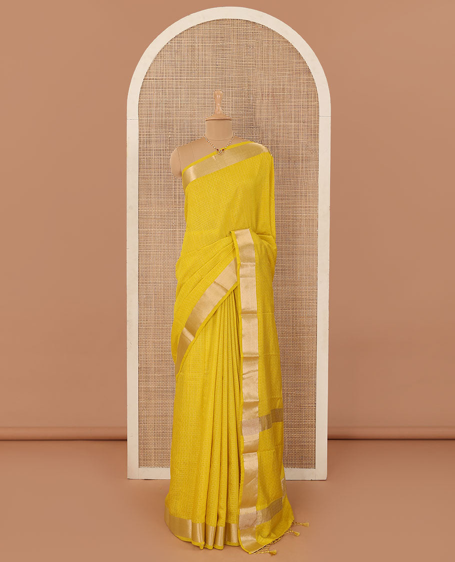 Yellow checked Assam silk saree, bavanji border, and pallu of stripes