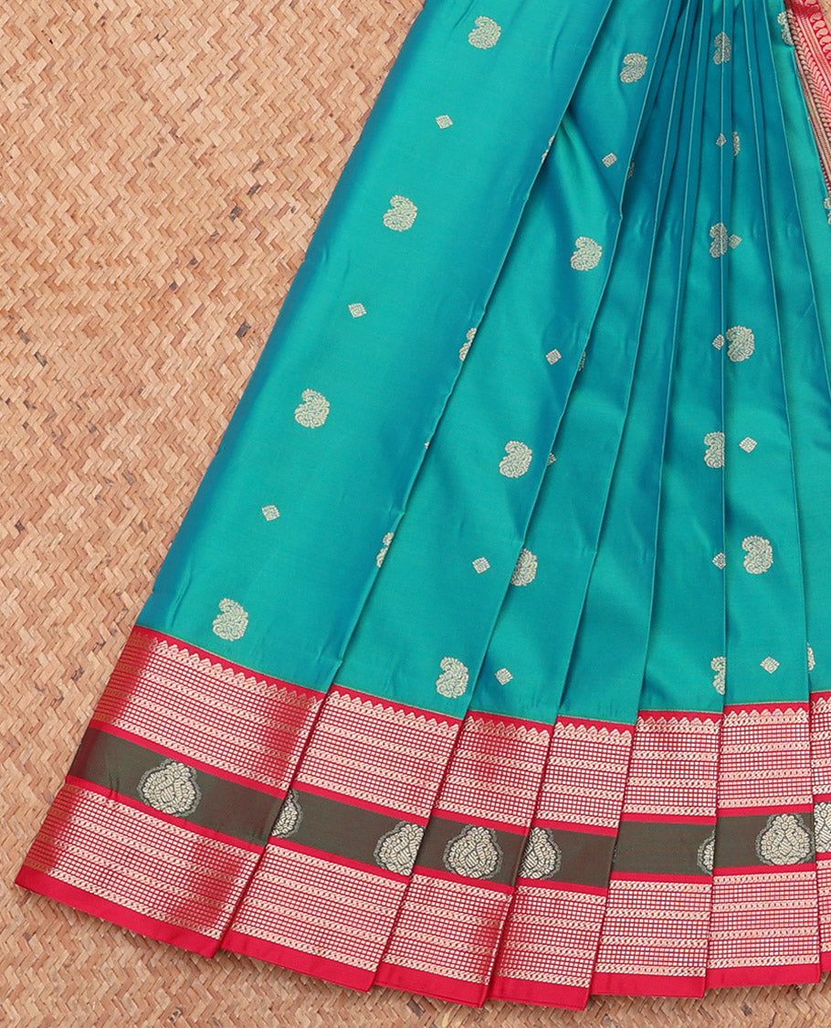 Blue Budget Silk Saree, Elegantly Framed with Zari Buttas, Complemented by a Contrast Traditional Zari Border, Grand Pallu, and a Contrast Blouse