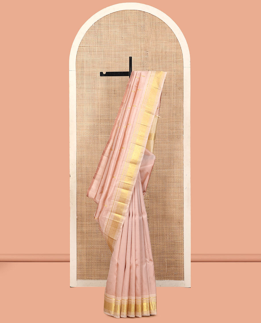 Light Sandal Kanchipuram Silk Saree, Subtly Sparkled with Buttas, a Contrast One-Sided Border of Panner Sombu, Banaras, Muthu, and Jaal Designs, a Zari Design Pallu, and No Blouse