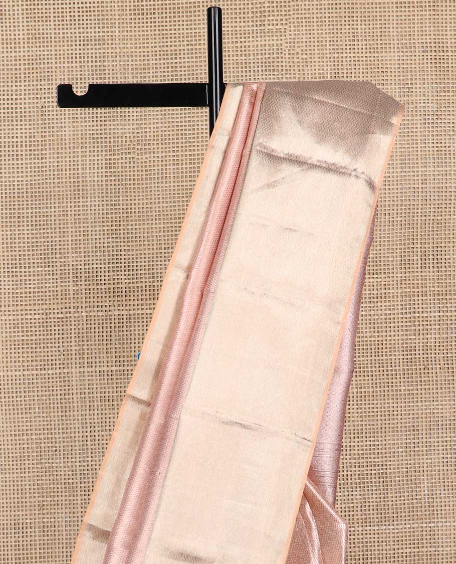 Baby pink striped kancheepuram tissue silk saree with contrast vanki design border & floral design pallu
