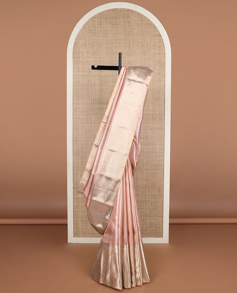 Baby pink striped kancheepuram tissue silk saree with contrast vanki design border & floral design pallu