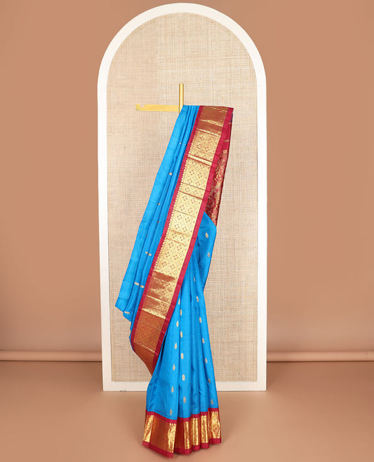 Blue zari buttas kanchipuram silksaree, contrast one-sided korvai jaal design border & floral design pallu