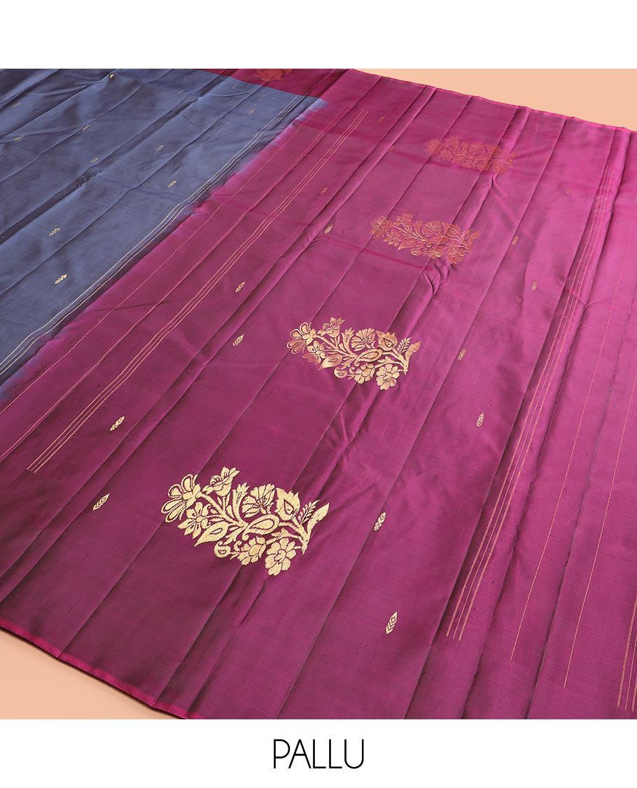 Grey Kanchipuram Silk Saree Highlighted with Zari Buttas, a Contrast Border of Floral Designs, a Subtle Woven Pallu of Floral Designs, and a Contrast Plain Blouse