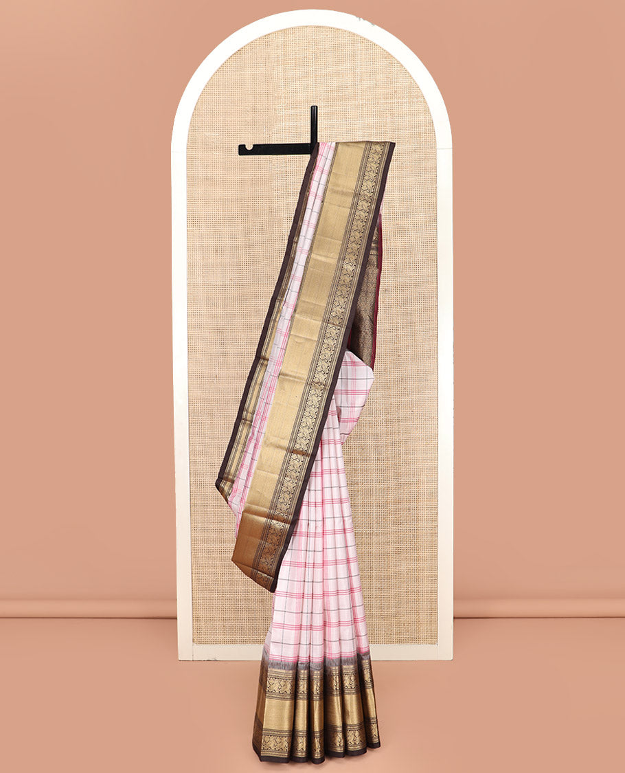 Off-White Kanchipuram Silk Saree Decked Up with Checks on Its Body, Complemented by a Contrast Border of Muthu and Mayil Designs, Majestically Detailed Pallu of Jaal Designs, and Paired with a Contrast Blouse