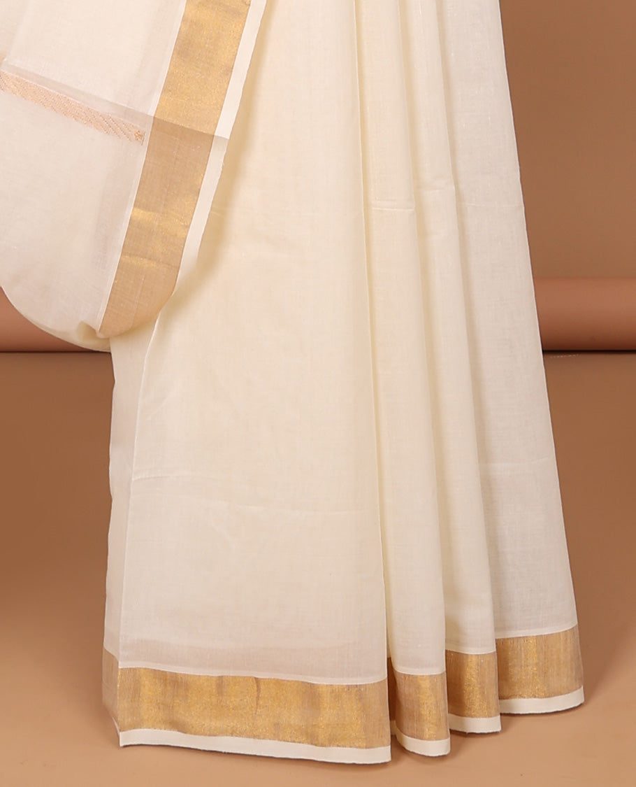 Cream kerala saree with zari stripes, plain border & pallu of peacock designs