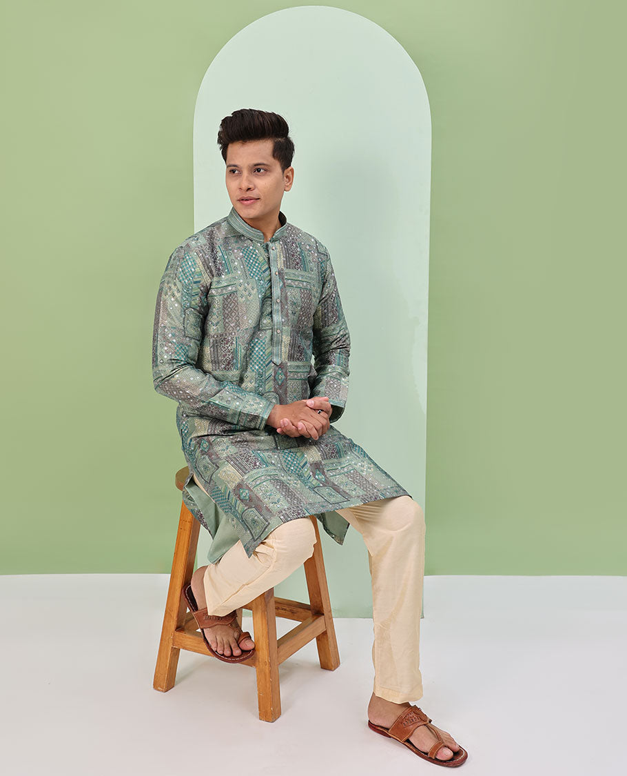 Green base, colorful Mughal-style floral and geometric motifs printed with glitter work, full-sleeved readymade kurta
